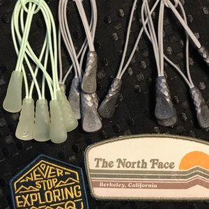 The northface zipper pulls and patches